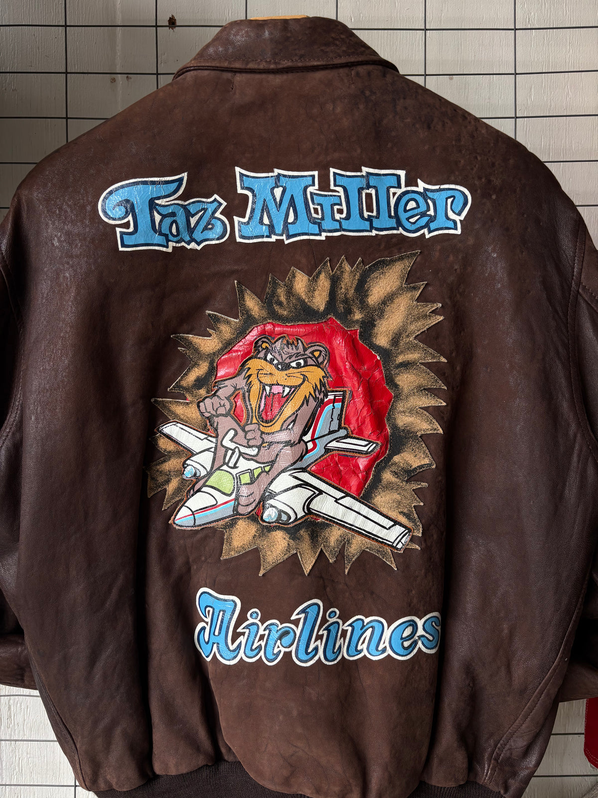 1990s Handpainted "Taz Airlines" A2 Leather Jacket
